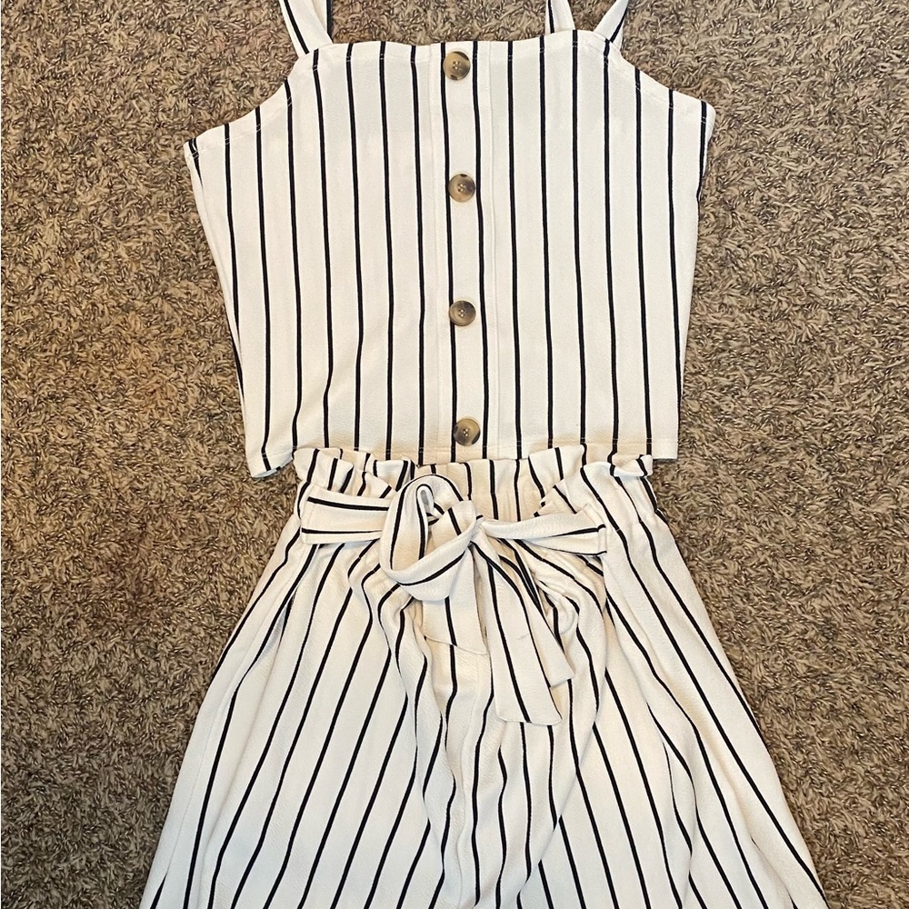 Two piece set. Kids size 14. Never worn no tags